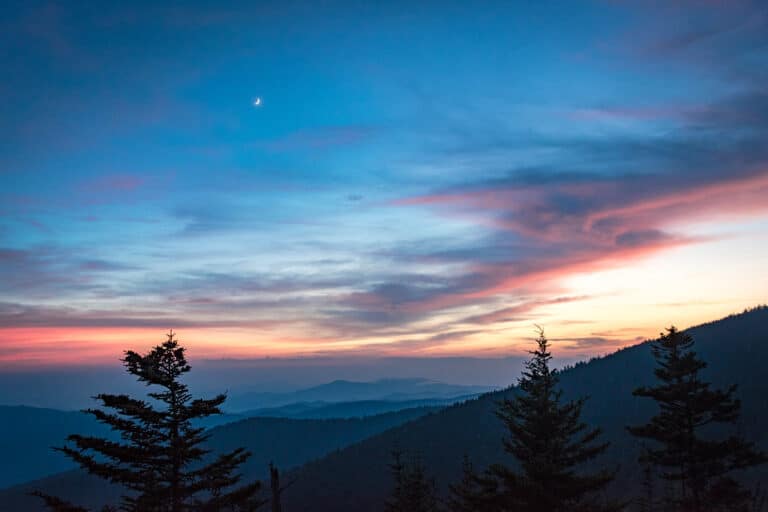 Layered blue ridges of the Great Smoky Mountains fading into haze at the horizon